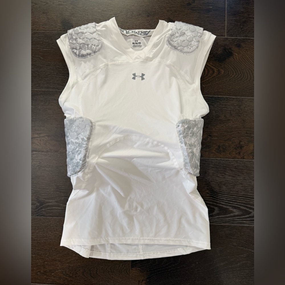 Under armor padded football shirt. NWOT. Size XL